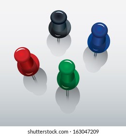 four colorful push pin with shadows