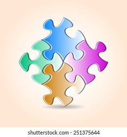 Four colorful puzzle pieces joined together with shadow