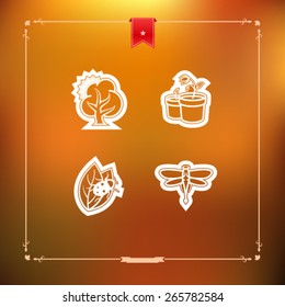 Four concept icons: spring, from left to right, top to bottom: Tree, Tulip in a pot, Ladybug & leaf, Dragonfly. 