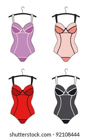 Four corsets on a hanger