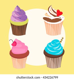 Four cupcakes on a yellow background