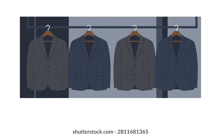 Four dark grey and navy suit jackets on wooden hangers displayed in a contemporary fashion store wardrobe section.