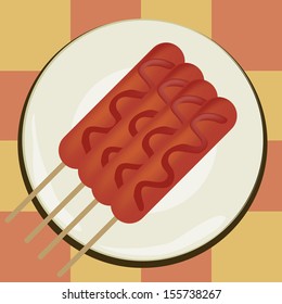 four delicious sausages with red sauce in the kitchen 