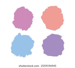 Four different colored paint spots on a white background