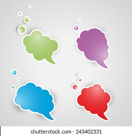 four different speak bubbles on gray background