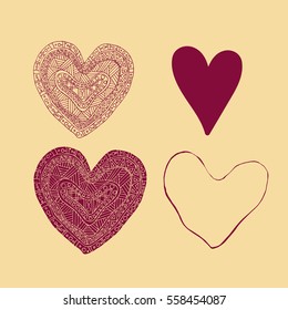 Four elegant vintage hand drawn hearts in doodle technic.
