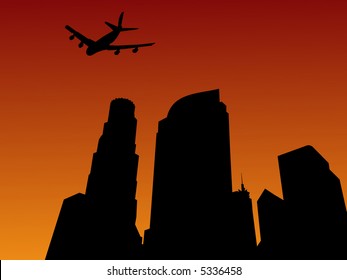 four engine plane arriving in Los Angeles at sunset