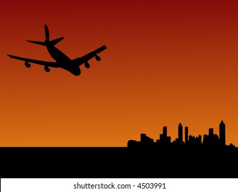 four engine plane flying towards Atlanta at dusk