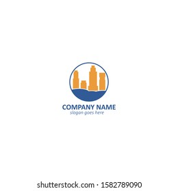 four gold buildings in a blue lined circle real estate logo