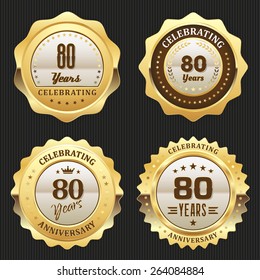 Four gold celebrating 80 years badges