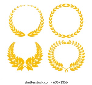 Four golden laurel brunches isolated on white