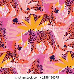 Four graphic cheetahs in different poses surrounded by exotic plants. Vector african seamless pattern drawn with rough brush in vibrant colors