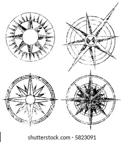 Four Grunge Compasses