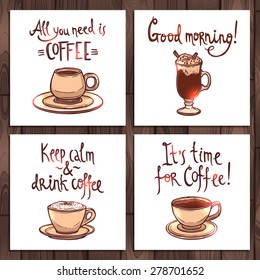 Four hand drawn illustration with coffee cups and typography on wooden background. Posters with quote lettering