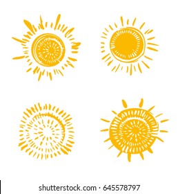Four hand drawn symbols of the sun. Solar templates in ethnic style.