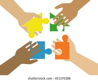 Four hands putting multicolor puzzle pieces together. Teamwork, cooperation, business, solution, work concept.