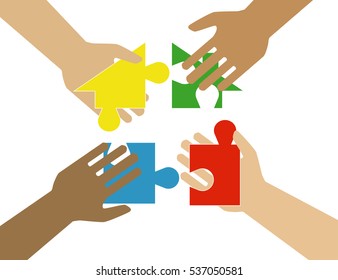 Four hands putting multicolor puzzle pieces together. Teamwork, cooperation, business, solution, work concept.