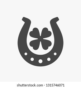 Four leaf clover in horse shoe simple fortune symbol. Luck patrick's day illustration icon in flat geometric style. Destiny superstition symbol sign. Vector illustration.