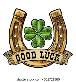 Four leaf clover, horseshoe, ribbon with text good luck. Vintage vector color engraving illustration for info graphic, poster, web. Isolated on white background.