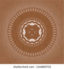 four leaf clover icon inside wooden emblem