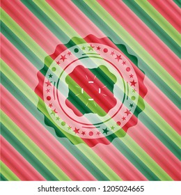 four leaf clover icon inside christmas colors style badge.