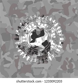 four leaf clover icon inside grey camouflage texture