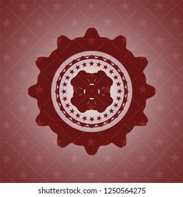 four leaf clover icon inside badge with red background