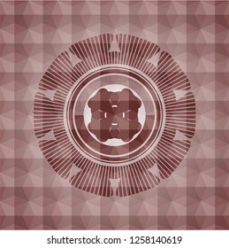 four leaf clover icon inside red seamless emblem with geometric background.