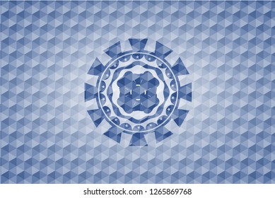 four leaf clover icon inside blue polygonal emblem.