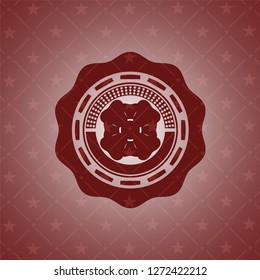 four leaf clover icon inside badge with red background