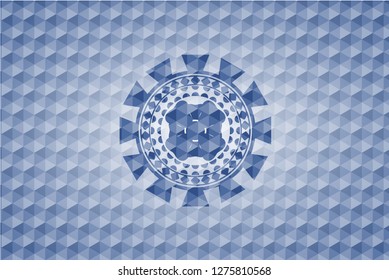 four leaf clover icon inside blue emblem or badge with abstract geometric pattern background.