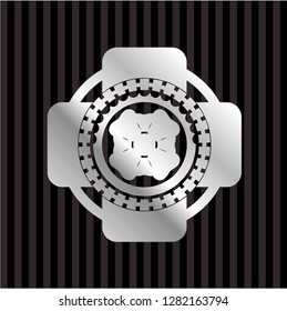 four leaf clover icon inside silver shiny badge