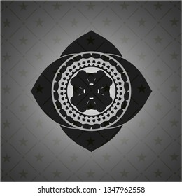 four leaf clover icon inside black badge