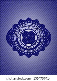 four leaf clover icon inside denim background