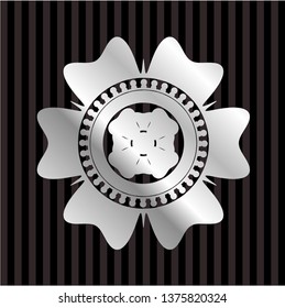 four leaf clover icon inside silver shiny emblem