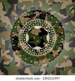 four leaf clover icon inside camouflaged emblem