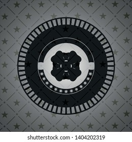 four leaf clover icon inside black badge