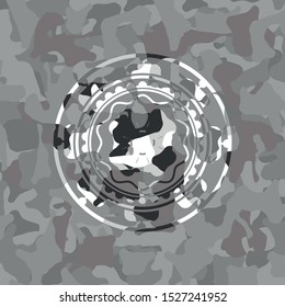four leaf clover icon inside grey camouflage emblem