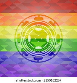 four leaf clover icon inside emblem on mosaic background with the colors of the LGBT flag. 