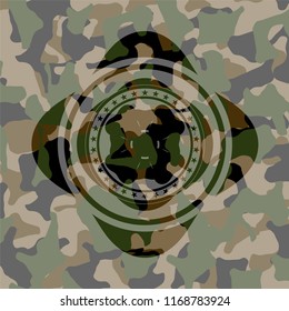 four leaf clover icon on camouflaged pattern