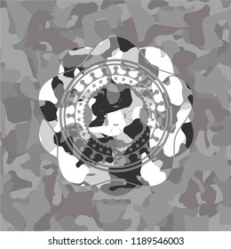 four leaf clover icon on grey camo texture