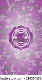 four leaf clover icon on pink camouflaged pattern. 