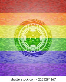 four leaf clover icon on mosaic background with the colors of the LGBT flag. 