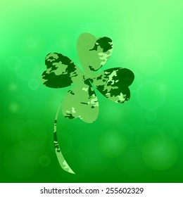 Four- leaf clover - Irish shamrock St Patrick's Day symbol. Useful for your design. Green  clover labels. St. Patrick's day clover icon  on green background.