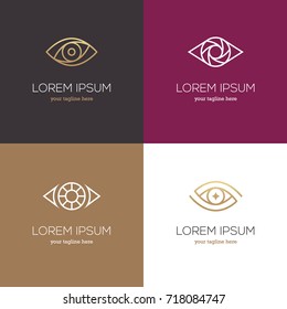 Four linear eye logo. Vision icon, symbol in white and golden colors.