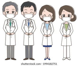 Four male and female doctors wearing masks.