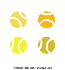 Four orange and yellow tennis balls on white