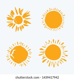 Four painted suns. Yellow Art Sun. Vector solar symbols set.