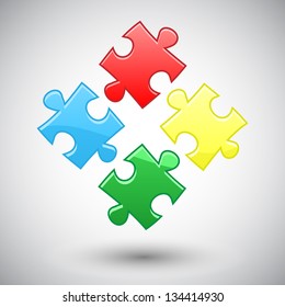 Four puzzles different colors with shadow. eps10