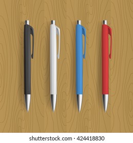 Four realistic pen for identity design on wooden background. Vector template illustration.